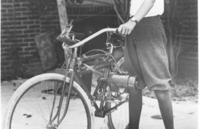 A young Howard Hughes and his motor-bike